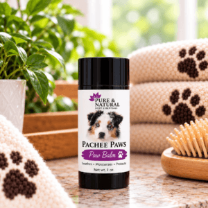 Pachee Paws Paw Balm for dogs in a 1 oz twist-up tube with Australian Shepherd, designed to moisturize and protect dry paw pads.