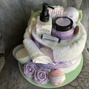 A cake made of towels and bath products