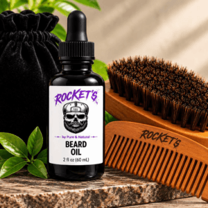 Rocket’s Premium Beard Care Kit with 2 fl oz Beard Oil, wooden boar bristle brush, anti-static wooden comb, and black velvet travel pouch