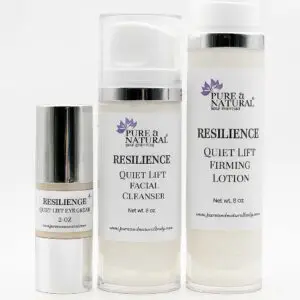 Three bottles of Pure & Natural Body Essentials' Resilience skincare line, including Quiet Lift Eye Cream, Facial Cleanser, and Firming Lotion, displayed on a clean white background for a professional product showcase.