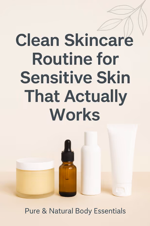 Flat lay of natural skincare products on a light background with green leaves and soft shadows, representing a clean skincare routine for sensitive skin.