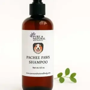 Amber bottle of Pachee Paws Natural Dog Shampoo by Pure & Natural Body Essentials on white background.