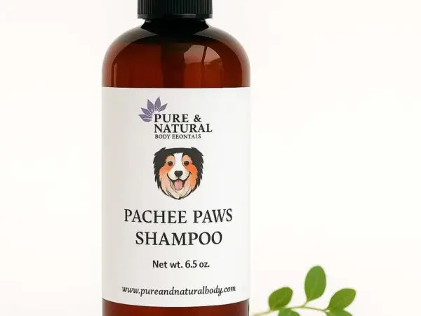 Amber bottle of Pachee Paws Natural Dog Shampoo by Pure & Natural Body Essentials on white background.